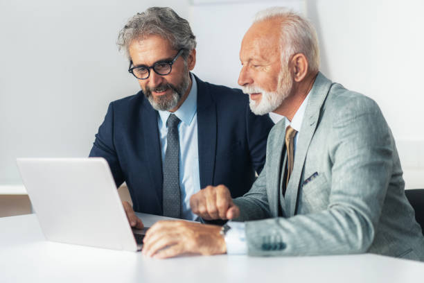 istock Business partners discussing 1610415283
