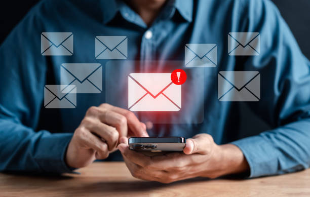 istock Alert Email inbox and spam virus with warning caution for notification on internet letter security protect, junk and trash mail and compromised information. 1610417859