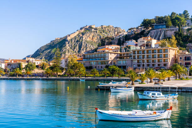 Nafplion, Greece - 14 February 2023 - Some empty fishing boats on the shore of the town of Nafplion on the Peninsula of Greece
