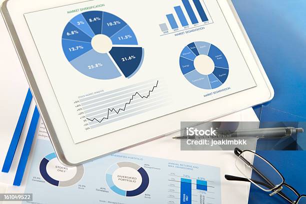Financial Analysis Comparison With Digital Tablet Stock Photo - Download Image Now - Banking Document, High Angle View, Business
