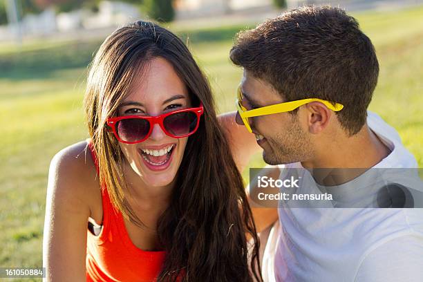 Happy Young Couple At The Park Stock Photo - Download Image Now - Adult, Affectionate, Beautiful People