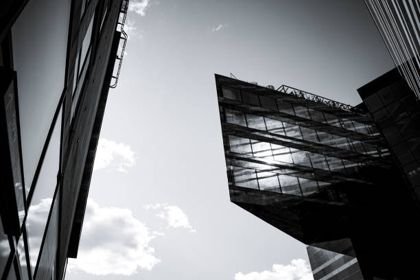 istock Low angle view of modern buildings against sky 1610617669