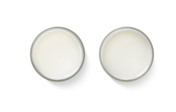 istock milk in glass, top view, isolated on white background 1610640742
