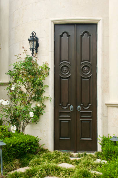 istock Elegant front door and garden courtyard 1610667443