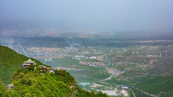 Beautiful view from Fansipan mountain with a Buddhistic temple. Sa Pa, Lao Cai Province, Vietnam. Travel and landscape concept