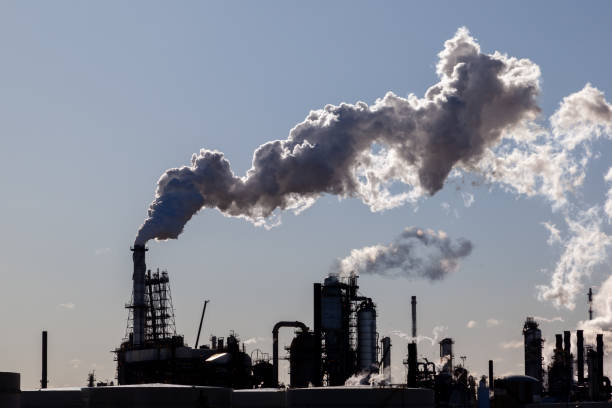 An oil refinery facility silhouette