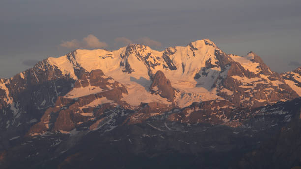 istock Bluemlisalp Range at sunset, view from Niesen Kulm, Switzerland. 1610779278