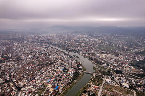 Aerial view of densely populated urban buildings along the river