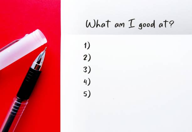 istock Pen and notebook on red background with handwritten text WHAT AM I GOOD AT? question to find out who you are, reveals true passion which could be your expertise and what you should do 1610806152