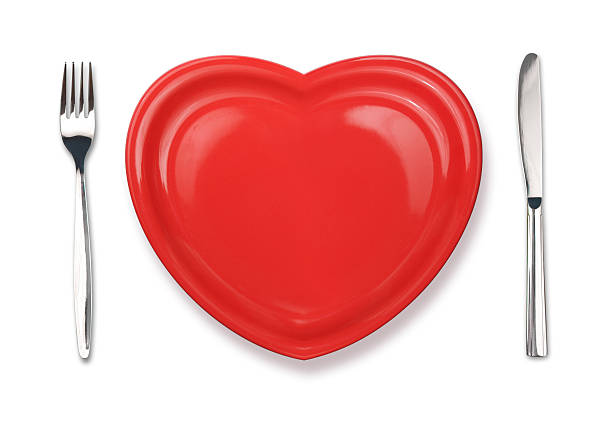 istock Knife, red plate in heart shape and fork isolated 161093366