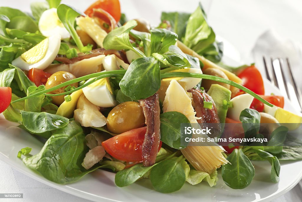 Insalata Nicoise - Foto stock royalty-free di Acciuga