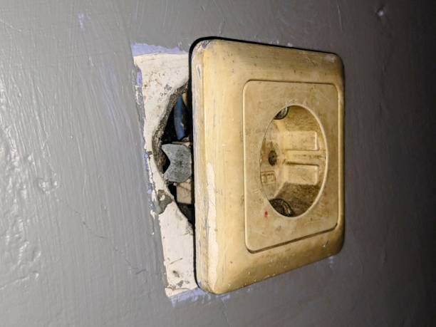 istock a dirty electical plug white socket fell out of the wall 1611030387