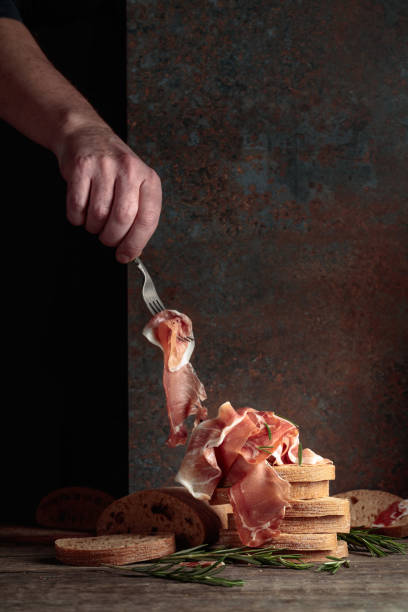 istock The hand of a prosciutto thief. 1611061324