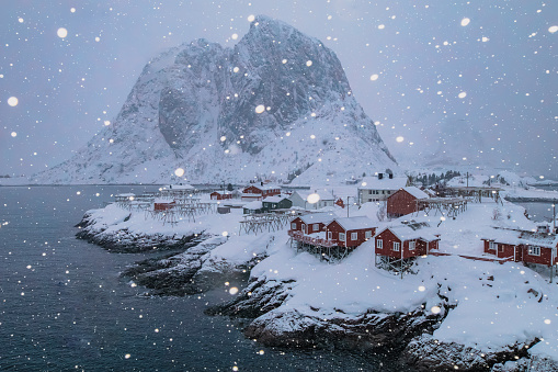Hamnoy is an iconic fishing village on Lofoten Islands, Norway. It is surrounded by the sea, fjords and mountains.