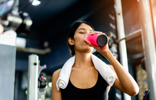 istock Drink water after exercising and sweating from strenuous exercise. tiredness from exercise 1611251359