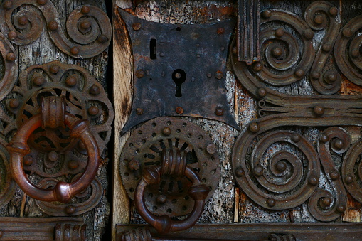 Ironwork on the door of the Chapel of the Trinity at Prunet-et-Belpuig in the Aspres region, Pyrénées-Orientales