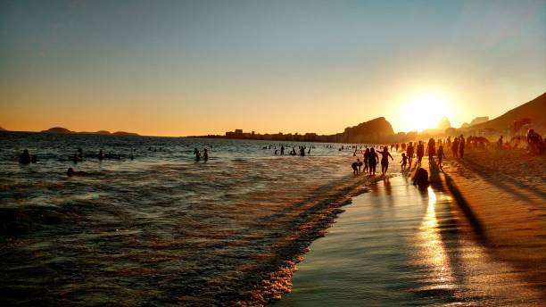 istock Reflections of the Sunset in Copacabana Beach, Rio de Janeiro 1611297601
