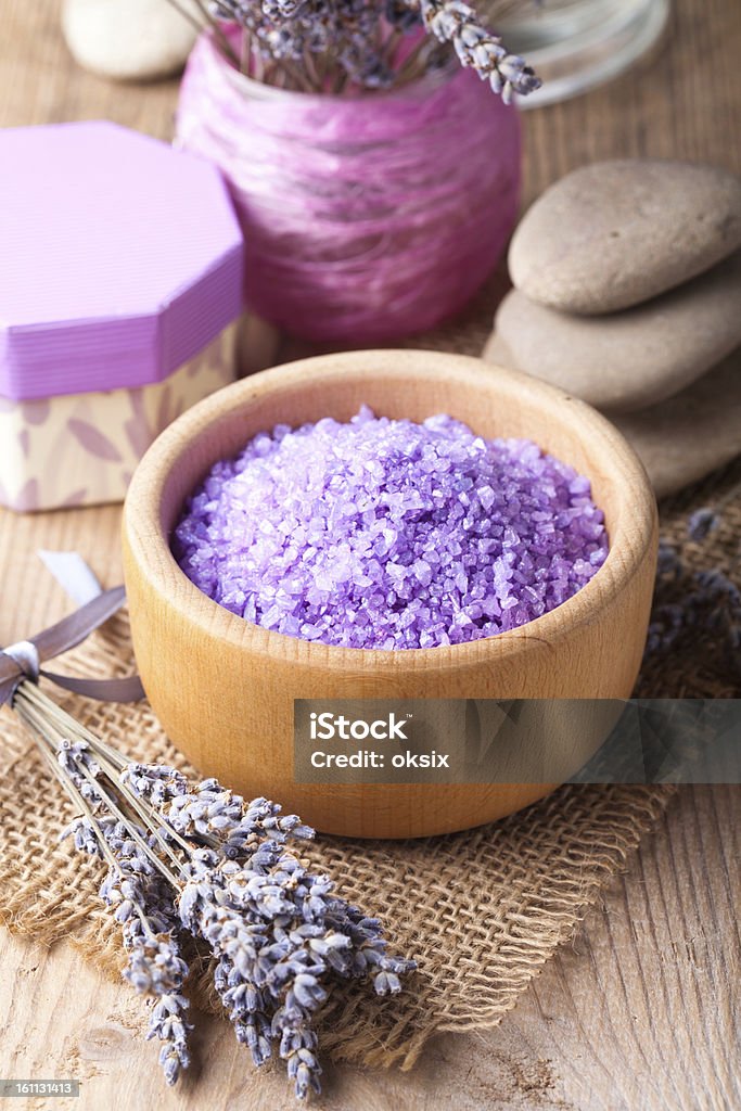 Lavender spa Lavender treatment soap and sea salt on wooden table Alternative Therapy Stock Photo