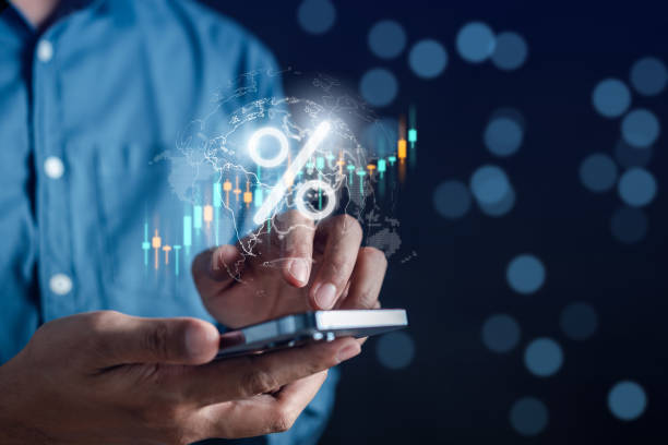 istock Businessman grips global investment chart, intertwining financial data analytics. Investor envisions world map for inflation insights, navigating stock market to reap profits. 1611324349