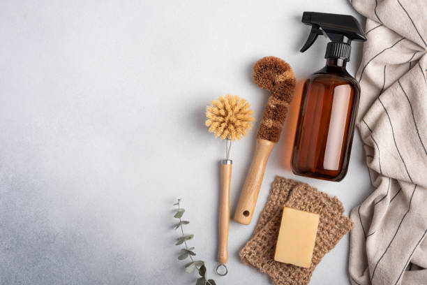 istock Eco-friendly soap bottle and wooden dish brushes. 1611371077