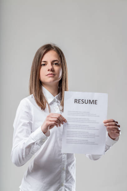 istock Describing competencies is a skill, woman in white shows or requ 1611404495
