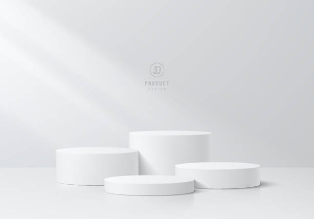 istock 3D podium background. Realistic level white cylinder pedestal set with light and shadow wall scene. Abstract composition in minimal design. Platforms for product display presentation. Stage showcase. 1611409765