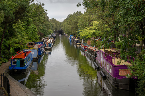 London, UK: Houseboats at Blomberg Road Moorings on Regent's Canal in London, part of the area known as Little Venice.