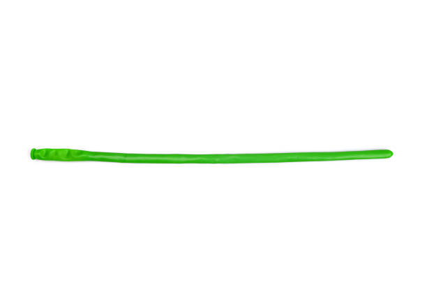 istock Green long unblown balloon isolated on white 1611454820