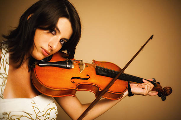 istock Woman playing the violing 161146403