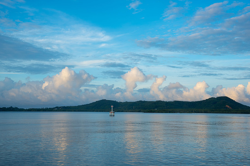 View of beautiful calm sea, blue sky and clouds in Phuket.