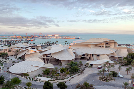 Doha, Qatar - April 15, 2023: Aerial view of National Museum of Qatar Sunset view