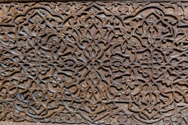Colorful vintage surface with an old oriental pattern. The background is a texture that has a decorative value. For overlay or texture designs