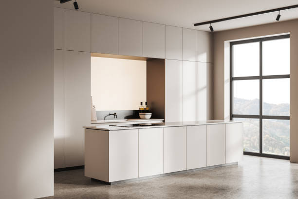 istock Beige kitchen interior with bar countertop and cooking corner, panoramic window 1611519737