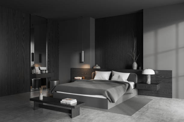 istock Dark bedroom interior with bed and minimal decoration, dressing table and mirror 1611529438