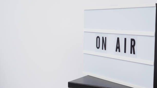 istock Light box sign with word on air put on table with white background. 1611530617