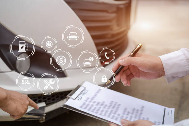 istock Insurance concept, insurance agent checking broken car and submit a claim form after an accident traffic accident 1611533894
