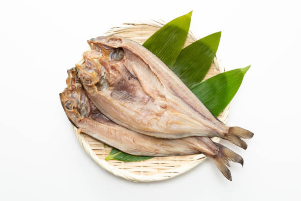 istock Dried Atka mackerel on white background. 1611539375