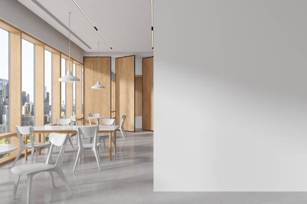 istock White and wooden office canteen interior with blank wall 1611539377