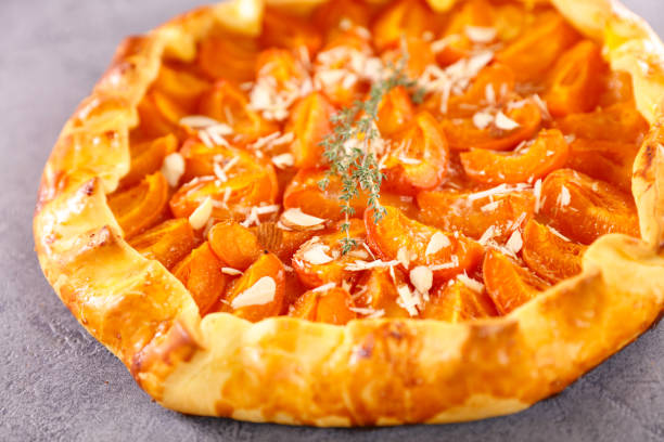 istock delicious apricot tart- summer dessert 1611540153