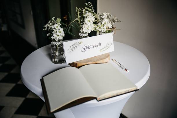 istock a table with a sign and a flower pot on it 1611543654