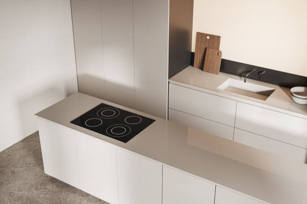 istock Top view of kitchen interior with bar island and cooking space with kitchenware 1611547956