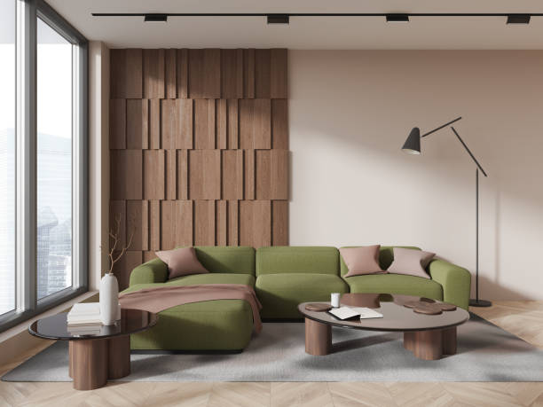 istock Light living room interior with corner couch and coffee table with window 1611551250