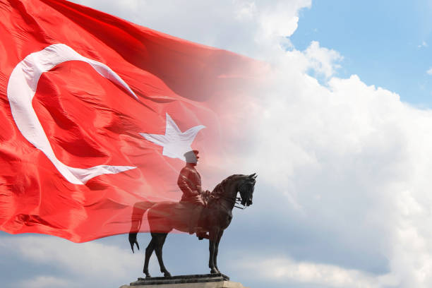 istock Turkish Flag and Ataturk monument. 1611551776