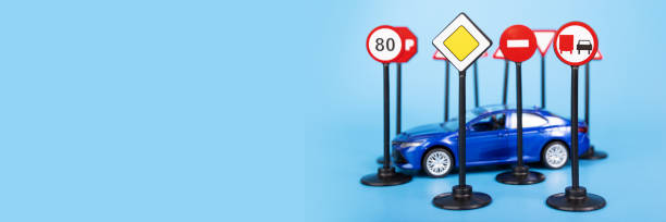 istock Online Driving Courses banner, traffic rules and regulations, driving exams, obtaining a driver's license 1611555465
