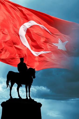 Turkish Flag with silhouette of Ataturk monument vertical photo. 30 august victory day of Turkiye.