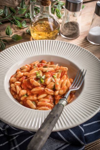 istock Cavatelli pasta with fresh tomato sauce. 1611619740