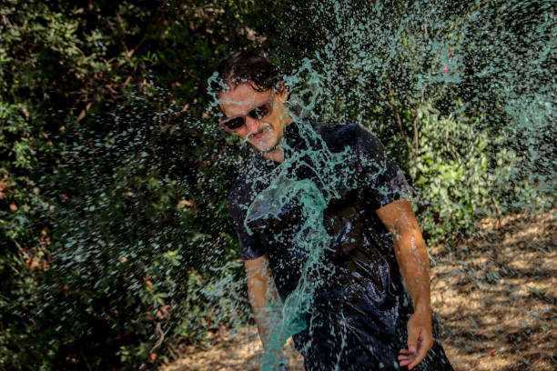 istock Young man soaked at the park 1611621877