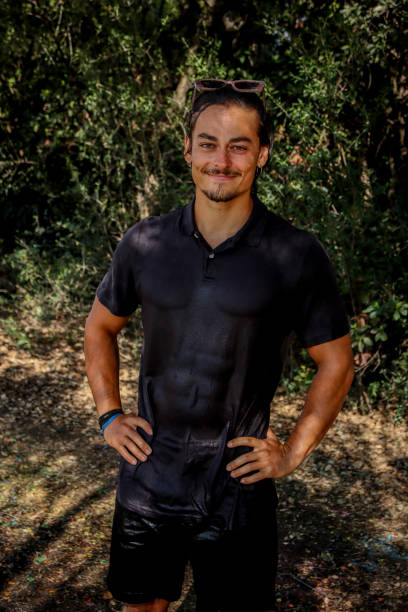 istock Young man soaked at the park 1611622417