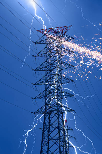 istock High Voltage electric substation with lightning- Electrical short circuit An electrical fault 1611641798