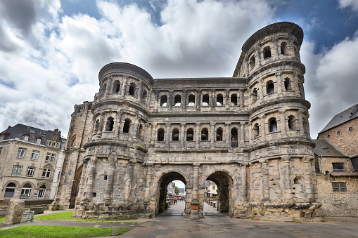 Porta Nigra, an ancient Roman gate in Trier, Germany\nWithin this photo all the visible tourists and logo's have been removed.\n\nIt's photo has build up from three exposures on to an High Dynamic Range (HDR) photo.